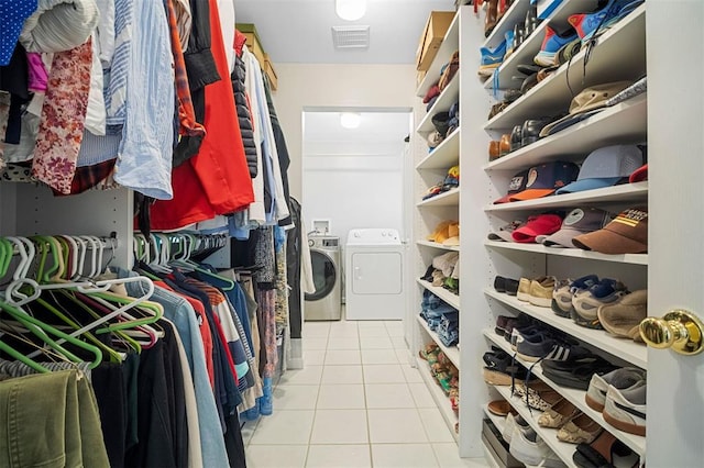 5 Homestead Acres, Olivette, MO 63132 - spacious closet featuring independent washer and dryer and tile patterned floors