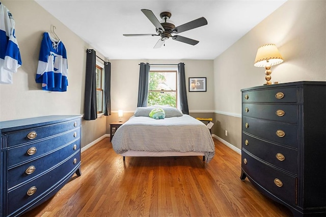 5 Homestead Acres, Olivette, MO 63132 - bedroom featuring wood finished floors, baseboards, and a ceiling fan