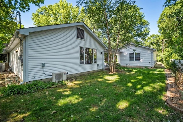 5 Homestead Acres, Olivette, MO 63132 - rear view of house with ac unit, a lawn, and cooling unit
