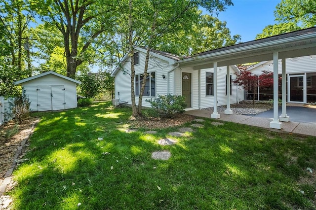 5 Homestead Acres, Olivette, MO 63132 - view of green lawn with a patio, an outbuilding, and cooling unit