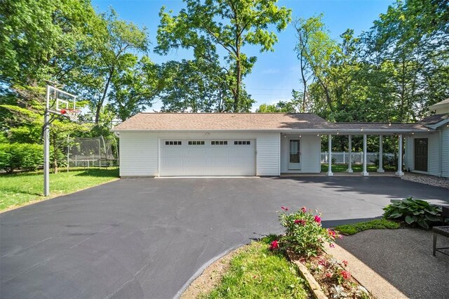 5 Homestead Acres, Olivette, MO 63132 - view of front facade featuring asphalt driveway and a garage