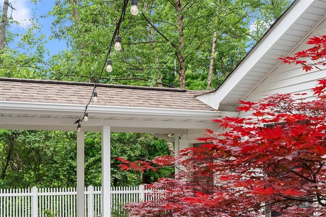 5 Homestead Acres, Olivette, MO 63132 - exterior view of roof with shingles, gutters, and a downspout