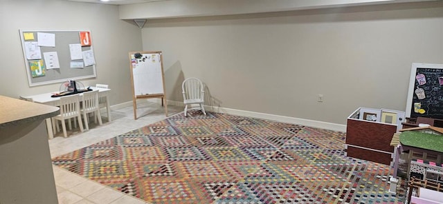 rec room with baseboards