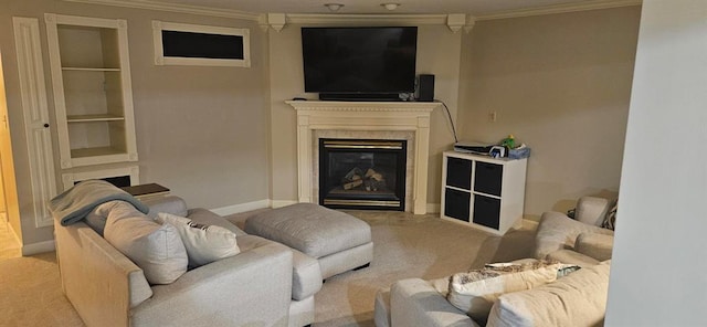 living area with crown molding, a premium fireplace, baseboards, and carpet floors