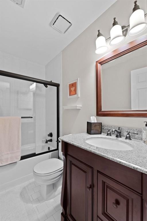 230 N Boyle Ave Unit B, Saint Louis, MO 63108 - full bath featuring toilet, vanity, and combined bath / shower with glass door