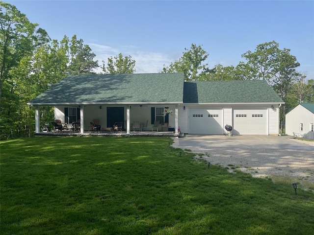 12460 Grassy Hollow Rd, Potosi, MO 63664 - view of front facade with an attached garage, driveway, a front lawn, and roof with shingles