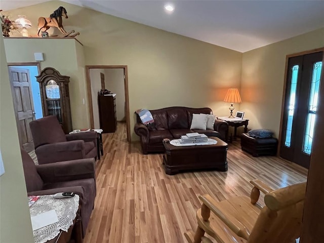 12460 Grassy Hollow Rd, Potosi, MO 63664 - living room with light wood-style flooring, vaulted ceiling, and recessed lighting