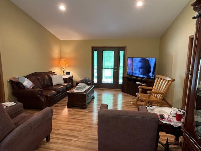 12460 Grassy Hollow Rd, Potosi, MO 63664 - living area with light wood-style floors, vaulted ceiling, and recessed lighting