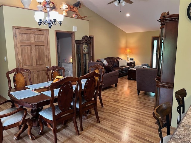 12460 Grassy Hollow Rd, Potosi, MO 63664 - dining area with light wood-style floors, vaulted ceiling, a chandelier, a ceiling fan, and recessed lighting