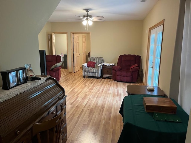 12460 Grassy Hollow Rd, Potosi, MO 63664 - living area with light wood-style floors and a ceiling fan