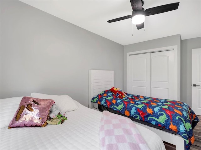 bedroom featuring a closet and a ceiling fan