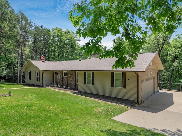 single story home with a garage, driveway, and a shingled roof