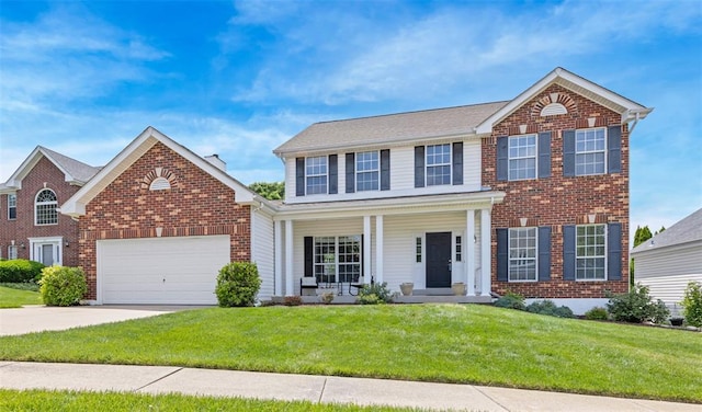 313 Golden Cherry Dr, Wildwood, MO 63040 - view of front of home featuring a porch, brick siding, a front lawn, and an attached garage