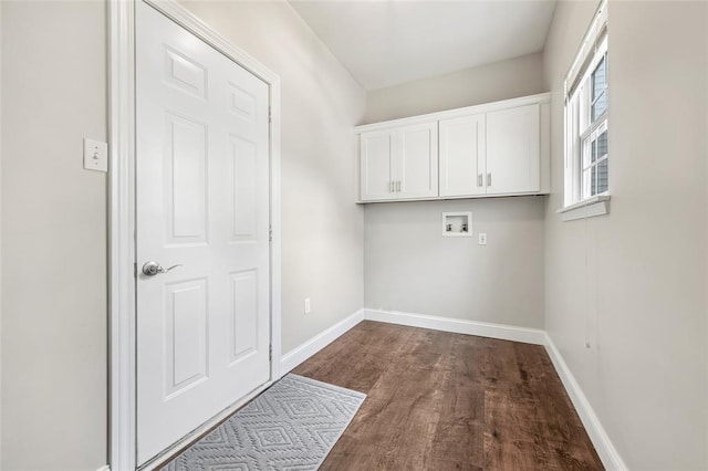 313 Golden Cherry Dr, Wildwood, MO 63040 - laundry room with hookup for a washing machine, cabinet space, dark wood-style flooring, and baseboards