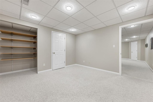 313 Golden Cherry Dr, Wildwood, MO 63040 - finished basement with a paneled ceiling, carpet floors, and baseboards