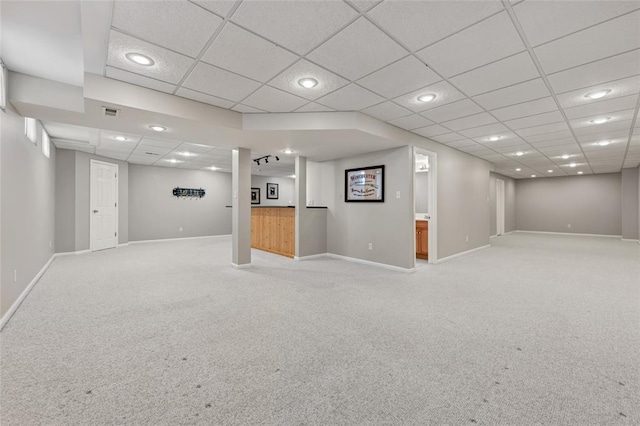 313 Golden Cherry Dr, Wildwood, MO 63040 - finished basement featuring light colored carpet, baseboards, a paneled ceiling, and recessed lighting