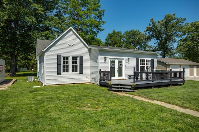 213 Quarry St, Staunton, IL 62088 - rear view of house with a deck, a lawn, french doors, and cooling unit