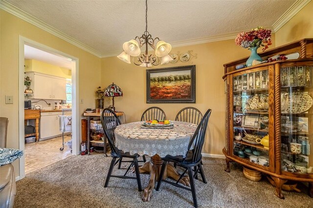 310 Smith Rd, Lebanon, MO 65536 - dining area with a chandelier, crown molding, a textured ceiling, and carpet flooring