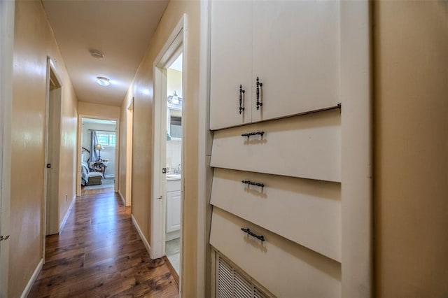 310 Smith Rd, Lebanon, MO 65536 - hall featuring wood finished floors and baseboards