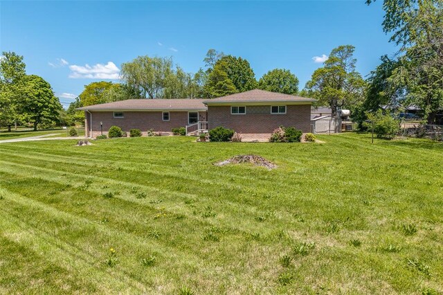 310 Smith Rd, Lebanon, MO 65536 - back of house featuring brick siding
