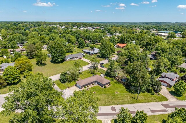310 Smith Rd, Lebanon, MO 65536 - aerial perspective of suburban area with a tree filled landscape