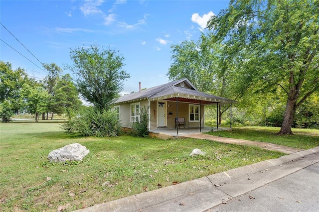6 Clay St, Park Hills, MO 63601 - view of front facade featuring a front lawn and a carport