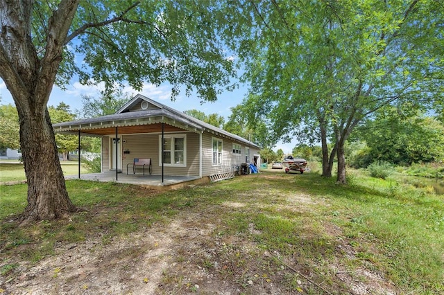 6 Clay St, Park Hills, MO 63601 - rear view of house featuring a patio