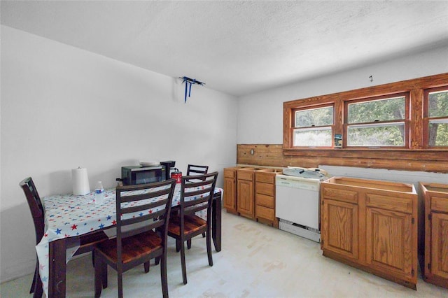 6 Clay St, Park Hills, MO 63601 - kitchen featuring white dishwasher, brown cabinetry, and a textured ceiling