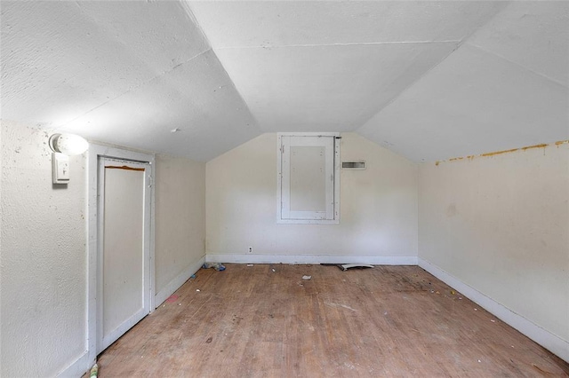 6 Clay St, Park Hills, MO 63601 - additional living space with wood finished floors, vaulted ceiling, and baseboards