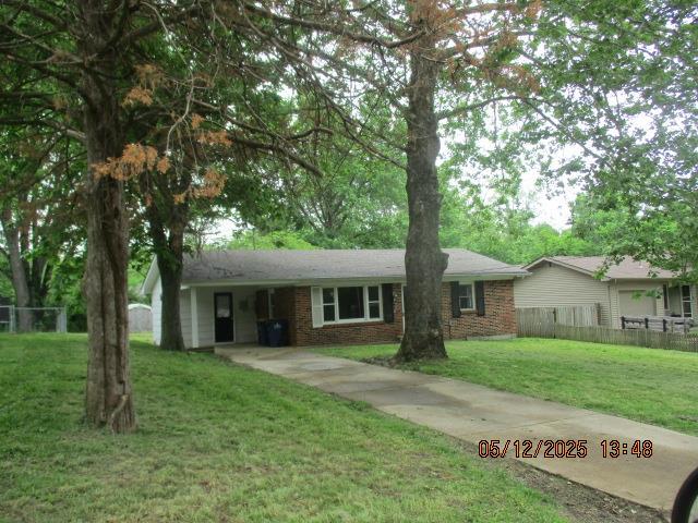 16 Richardson Dr, Union, MO 63084 - ranch-style home featuring driveway, an attached carport, and brick siding