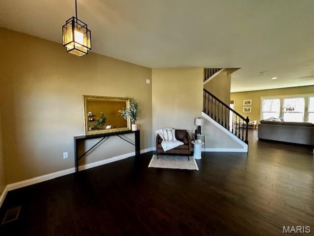 2001 Paul Renaud Blvd, Lake St Louis, MO 63367 - living area with stairs, wood finished floors, and baseboards