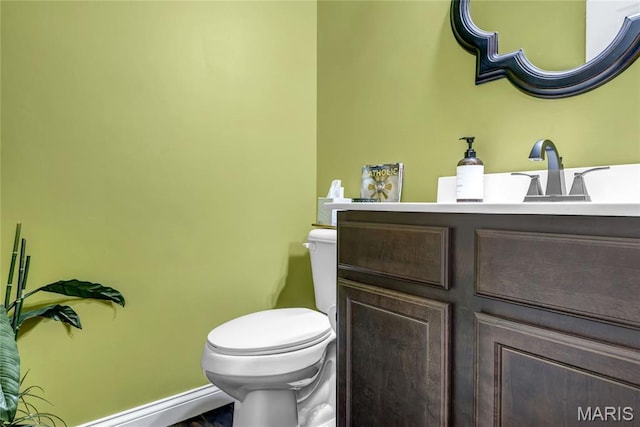 2001 Paul Renaud Blvd, Lake St Louis, MO 63367 - half bathroom with toilet, vanity, and baseboards