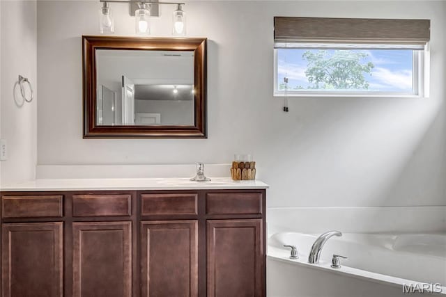 2001 Paul Renaud Blvd, Lake St Louis, MO 63367 - bathroom with a bath and vanity