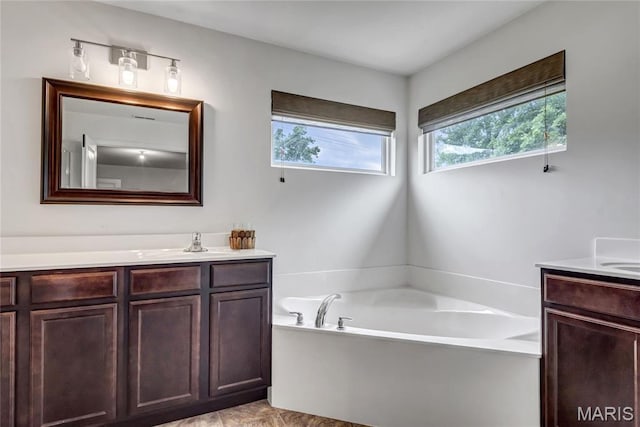 2001 Paul Renaud Blvd, Lake St Louis, MO 63367 - full bathroom featuring vanity and a garden tub