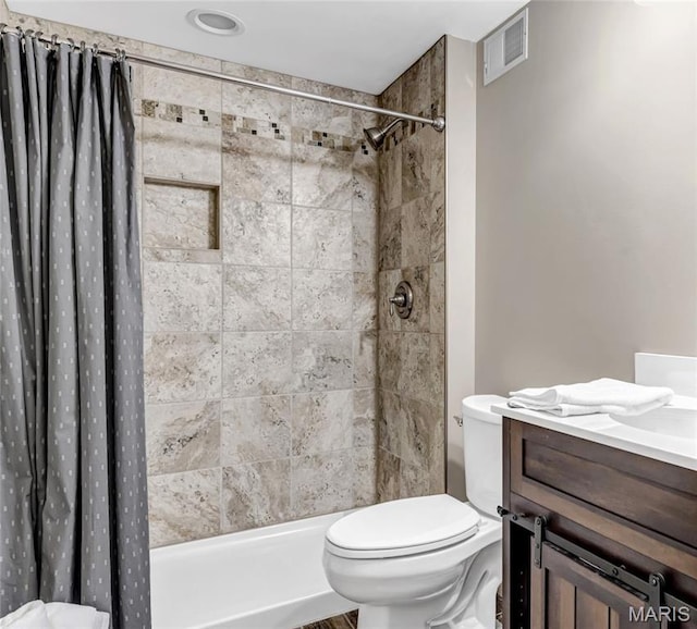 2001 Paul Renaud Blvd, Lake St Louis, MO 63367 - full bathroom with toilet, vanity, and tiled shower