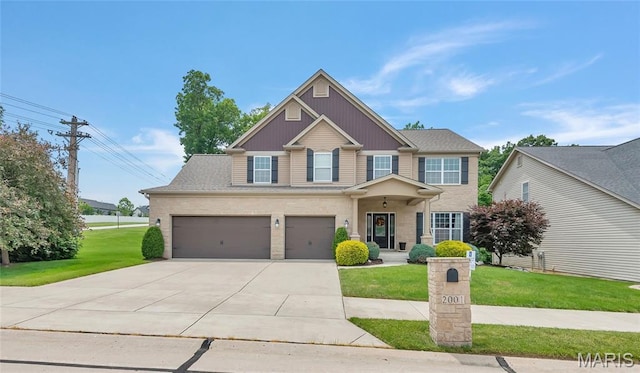 2001 Paul Renaud Blvd, Lake St Louis, MO 63367 - view of front of property with driveway, a front lawn, and an attached garage