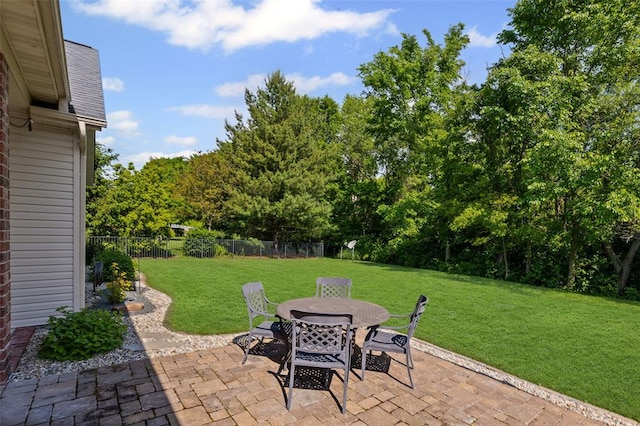 1514 Autumn St, Godfrey, IL 62035 - view of patio / terrace featuring outdoor dining space