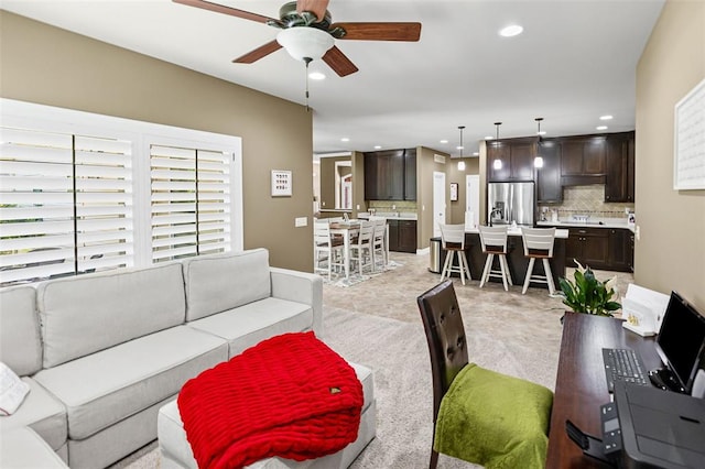 1514 Autumn St, Godfrey, IL 62035 - living area with a ceiling fan, recessed lighting, healthy amount of natural light, and light carpet