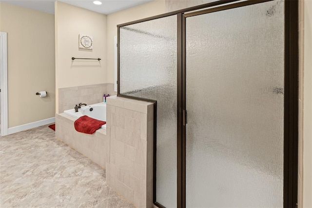 1514 Autumn St, Godfrey, IL 62035 - bathroom with a garden tub, a stall shower, baseboards, and recessed lighting