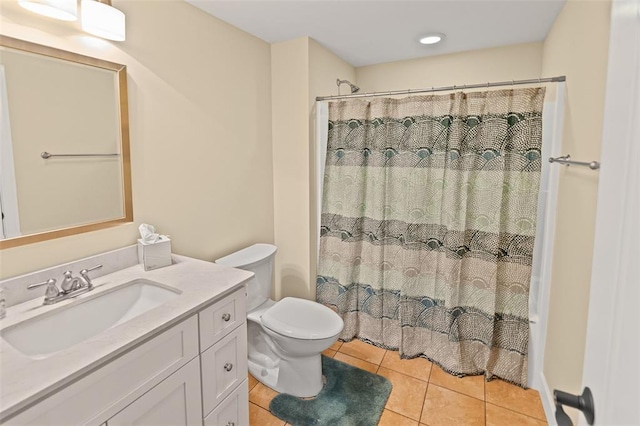 1514 Autumn St, Godfrey, IL 62035 - bathroom featuring tile patterned floors, toilet, vanity, and curtained shower