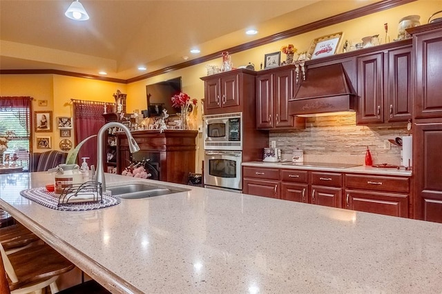 205 Hickman Dr, Bowling Green, MO 63334 - kitchen featuring custom exhaust hood, a sink, crown molding, black electric stovetop, and a breakfast bar area