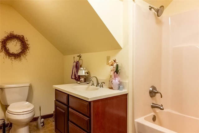 205 Hickman Dr, Bowling Green, MO 63334 - bathroom featuring lofted ceiling, toilet, vanity,  shower combination, and baseboards