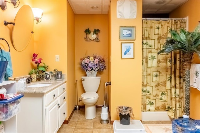 205 Hickman Dr, Bowling Green, MO 63334 - bathroom featuring toilet, vanity, tile patterned flooring, and curtained shower