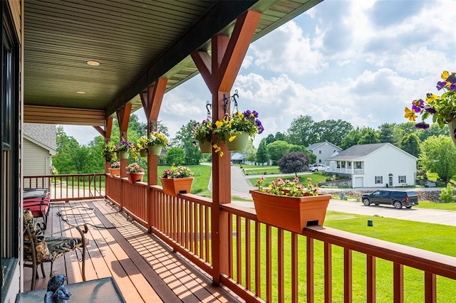 205 Hickman Dr, Bowling Green, MO 63334 - wooden terrace with a porch, a yard, and a residential view