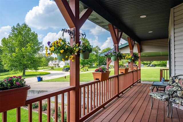 205 Hickman Dr, Bowling Green, MO 63334 - wooden terrace featuring covered porch and a lawn