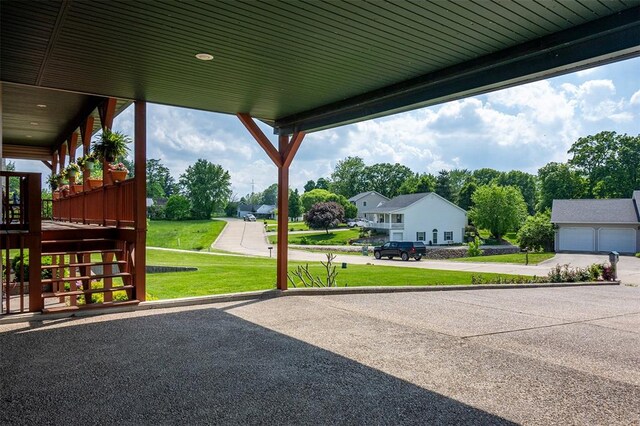 205 Hickman Dr, Bowling Green, MO 63334 - view of patio / terrace with stairs, concrete driveway, a deck, and a garage