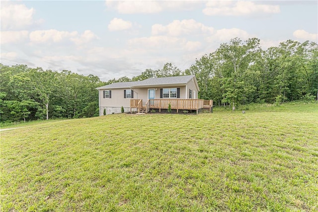 26805 Stephanie Ln, Laquey, MO 65534 - view of front facade with a wooden deck and a front yard