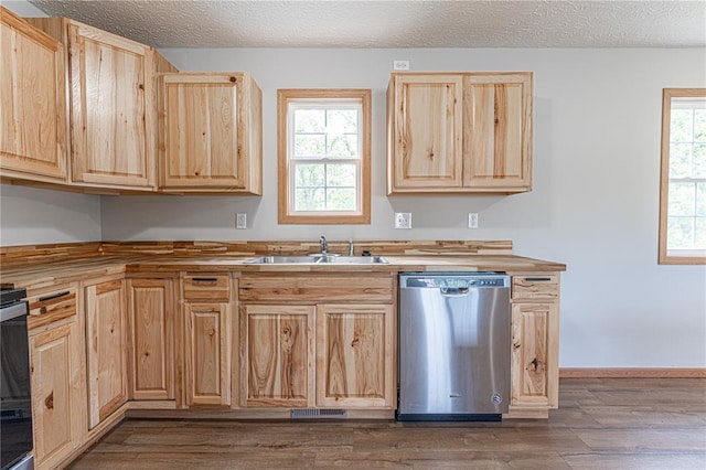 26805 Stephanie Ln, Laquey, MO 65534 - kitchen featuring dishwasher, light brown cabinets, a sink, wooden counters, and a textured ceiling