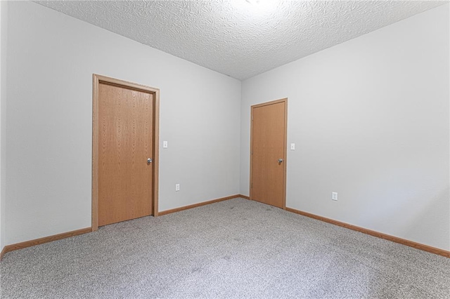 26805 Stephanie Ln, Laquey, MO 65534 - spare room with light colored carpet, baseboards, and a textured ceiling