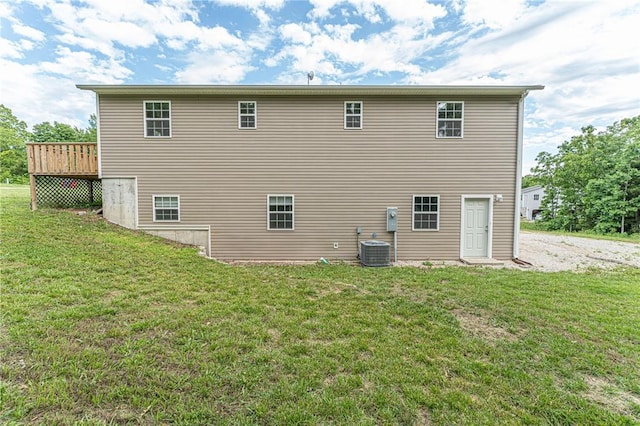 26805 Stephanie Ln, Laquey, MO 65534 - rear view of house with a yard, a deck, and central AC